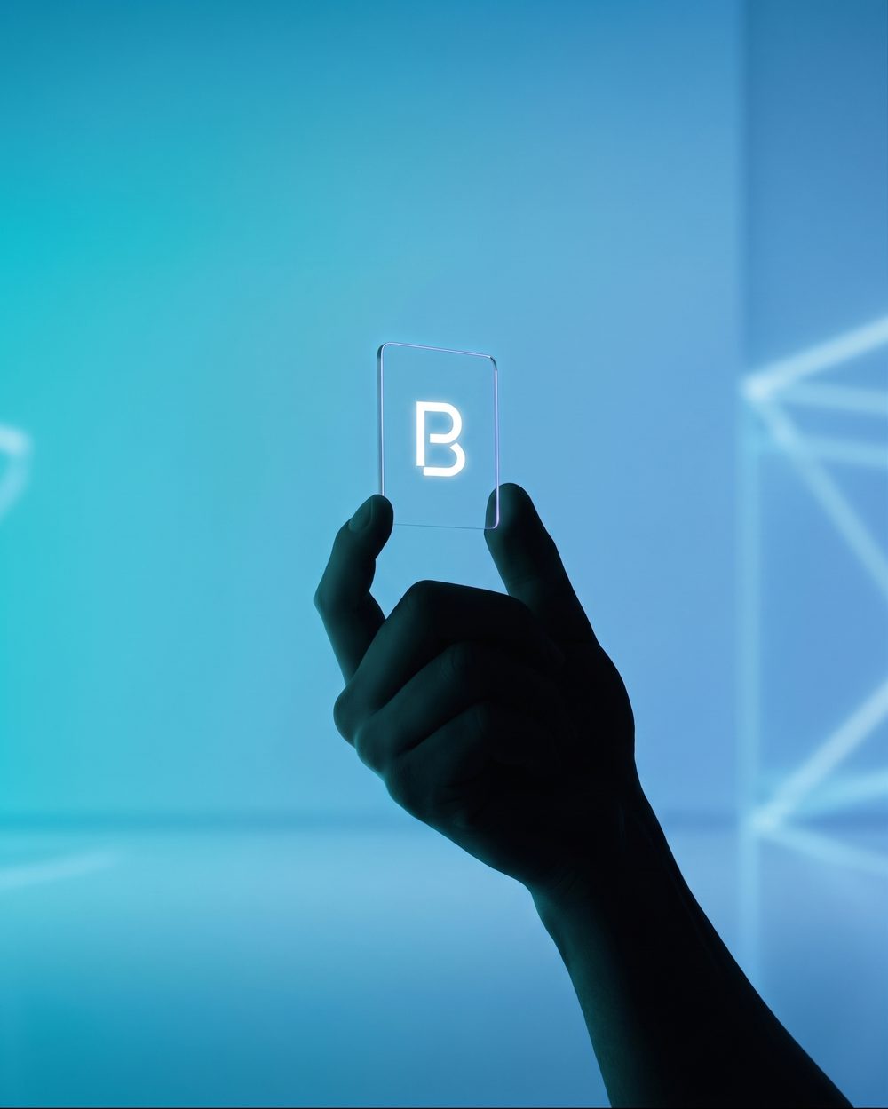 Hand holding a glowing glass Polderbyte logo card